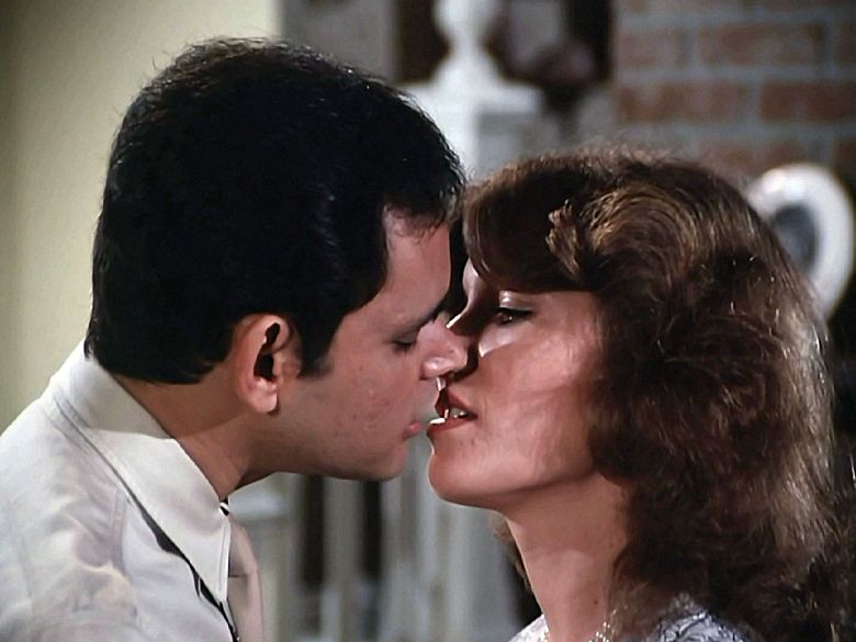 Eddie Ramirez kisses Mary Ellen.